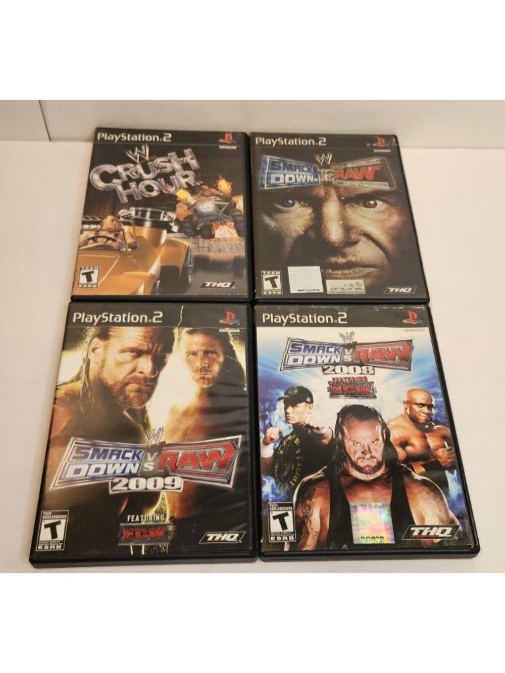 PS2 4 Game Bundle WWE Smack Down 2008,2009 & Raw And Crush Hour Tested